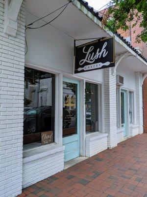 Outside. Storefront. Entrance. Located just off Marietta Square. Free street parking available outside.