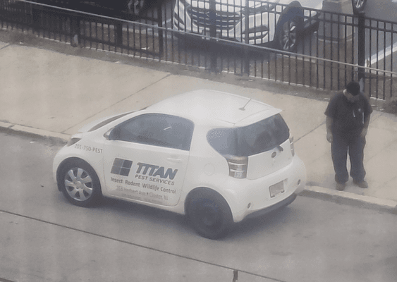 Titan Pest Services employee spitting on the ground caught on camera