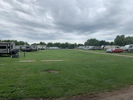 A bunch of open green grass for running around when no RV are parked in the spots.