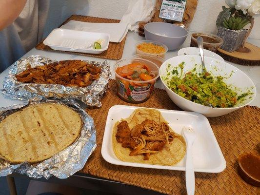 Feast for 4! Carrots purchased separately along with big salsa tub. Guac was homemade.  Great meal for 19 bucks.