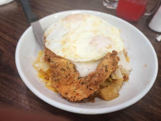 Chicken fried chicken bowl with over medium eggs