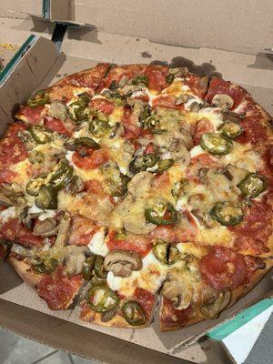 Pepperoni, mushroom, jalapeños, spicy cheese blend for Mr. Texas - Delicious !!!