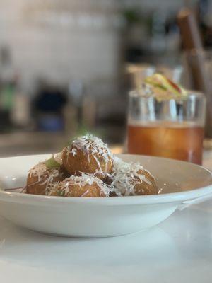 A "La Fresa Surena" to wash down the most sinful Fried Shrimp and Grits up at the bar top!