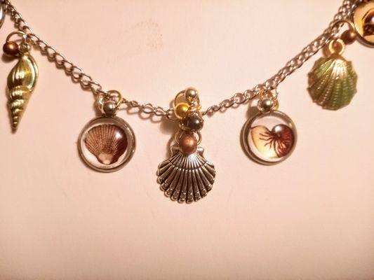 Shell charm necklace.