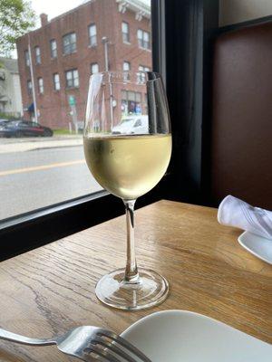 Try the Greek wine. It's pairs wonderfully with the spanakopita & free pita & tzatziki. Free municipal parking across the street too.