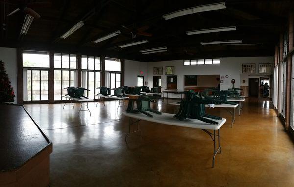 Tables and chairs await your next gathering! There is also a stage for music or guest speakers