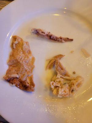 Clockwise, bone, fat, skin from my so called chicken & Pasta entrée. It only has 2 pcs of chicken!!