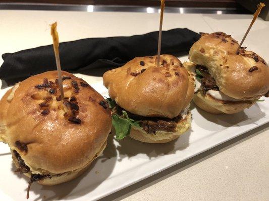 Pot roast sliders on onion buns with horseradish sauce and arugula. They're good!