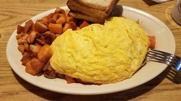 3 egg omelet with home fries.