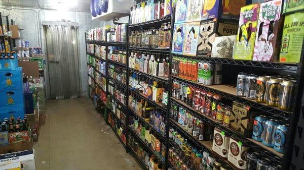 Half of the beer cave with many different craft beer and microbrews