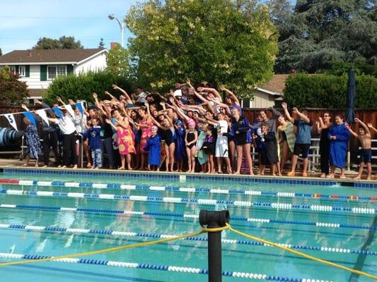 One of our famous team cheers before a home meet.  We can out dance, cheer (and swim) anyone!