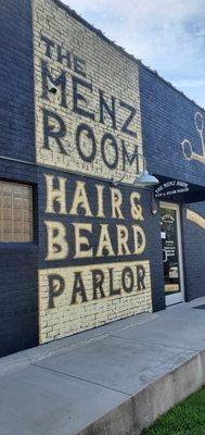 Entrance to The Menz Room Hair & Beard Parlor Building.