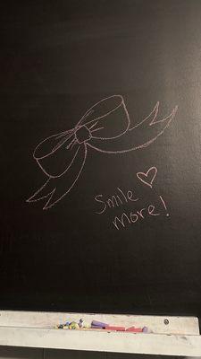 Chalkboard wall in bathroom