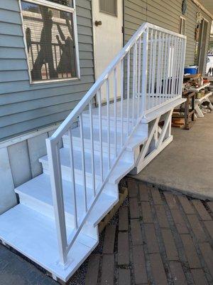 Custom railing built powder coated Glossy White.