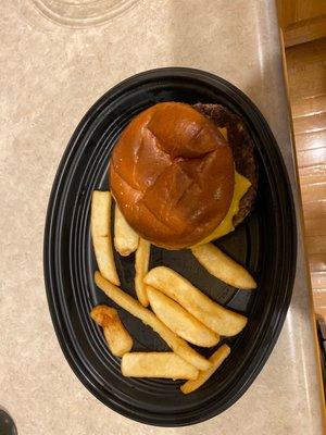 Weak looking cheese burger with like 10 fries.  Really?