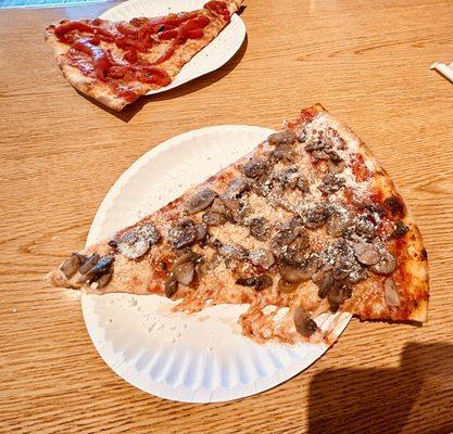 Foreground - mushroom slice. Background - roasted red pepper slice.