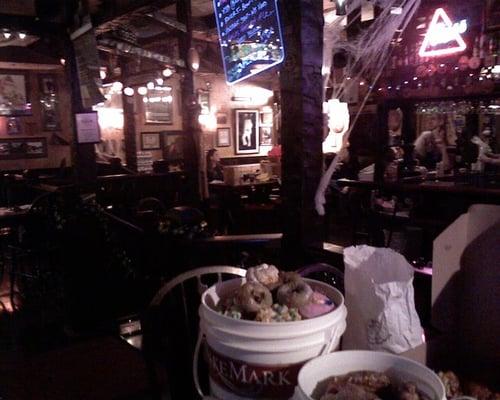 Jen & Buckets of VooDoo Doghnuts await Brew Bus Trippers, meeting at the Horse Brass. (thanx, Don & crew, and Jen & Yvette !