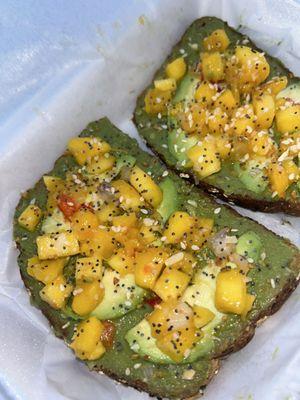 Avocado toast with mango on top