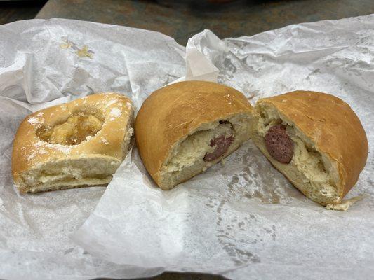 An apple kolache and a sausage kolache (I forgot what their real names were)