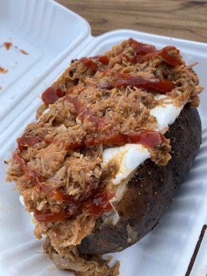 No meal on earth except maybe their ribs could beat this pulled pork stuffed potato.