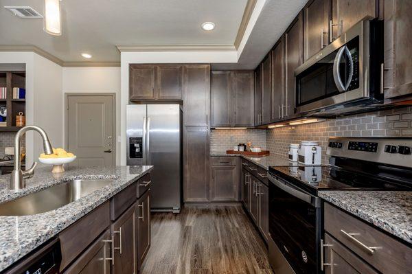 Solid Wood Cabinetry with Designer Backsplash!