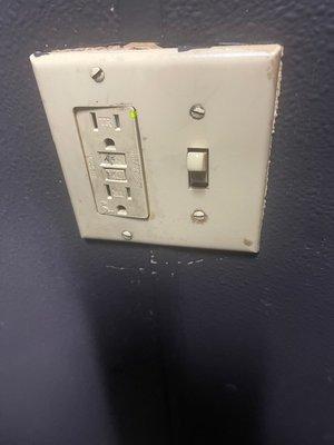 Gross restroom light switch