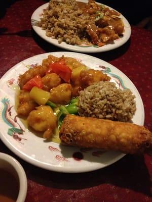 Sweet and sour chicken lunch combo with almond chicken in the background. :)