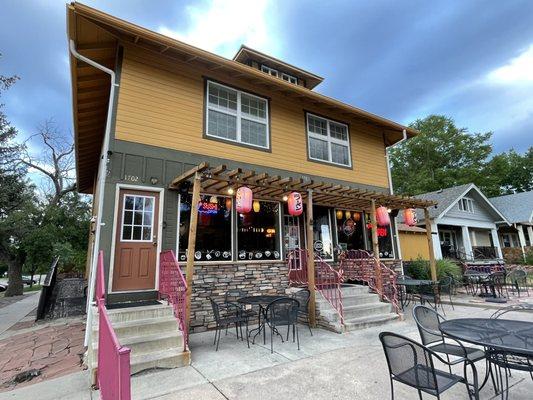 Outside of the restaurant with seating