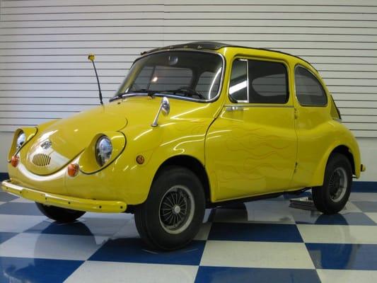 Our Mascot Marty is a restored1969 Subaru 360 Sedan