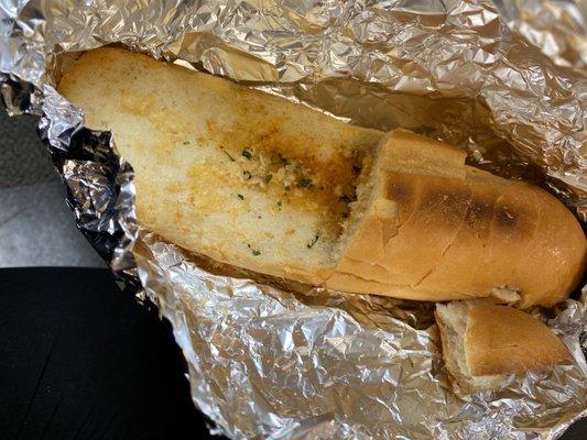 Garlic Bread was dry, hard and tasted very bad.