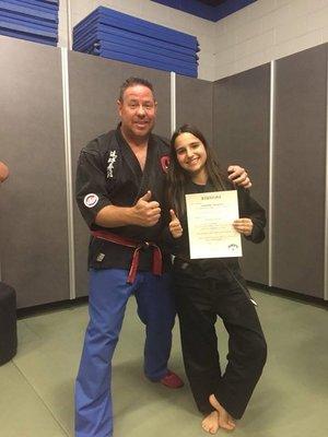 Earning her brown belt with karate Bill!