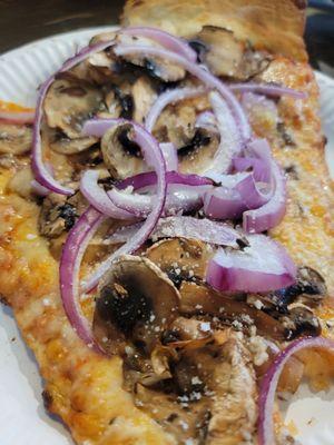 Loved pizza slice, mushroom and onion