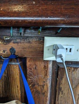 Perfect! You can charge your phone and hang your bag under the bar.