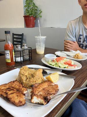 Fish and mofongo platter with side salad. (Smoothie and empanadilla have been almost entirely consumed.)