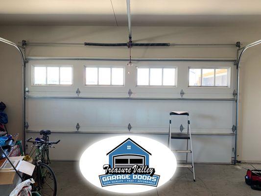 Broken Garage door spring replacement and garage door adjustment in Kuna ID