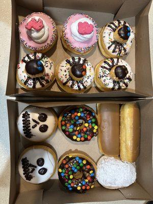 Animal cookie donuts, spider donuts, skeleton, m&m donuts, raspberry filled, maple bars!!