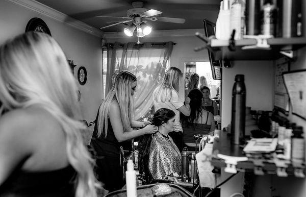 Tracy, Cameron and Dawn prepping the wedding party