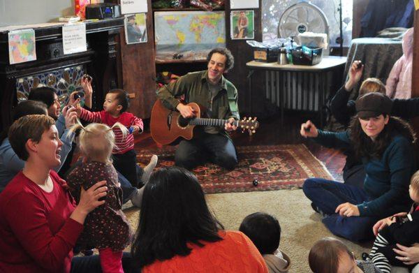 Jay and kids enjoying an All Around This World music class