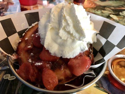 Fluffy pancakes with strawberry and whipped cream