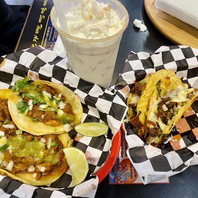 Al pastor tacos, horchata, and birria tacos with consommé.