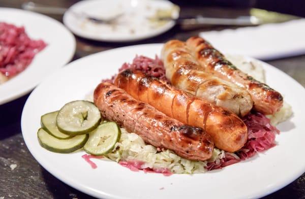 Sausage Platter $28 "a selection of 4 sausages served with mashed potatoes, sauerkraut, rotkohl, pickles and mustard"