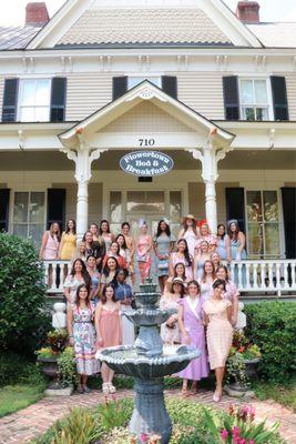 Tea party guests on the front stairs