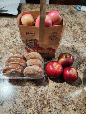 Red lady apples and wine sap apples with cider donuts glazed and original.