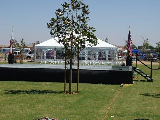 40'x40' Tent; Stage with Skirting and Stair Package and Chairs.