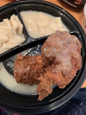 Soggy fried chicken and those are two sides of dumplings. What a rip off. It looks like they took it out of the garbage dumpster.