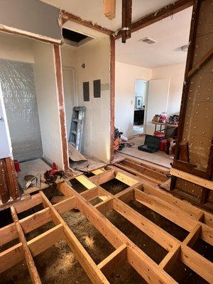 Floor joist reframe for bathroom with major dry rot damage.