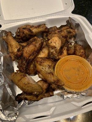 12 piece grilled chicken wings with hot sauce on side