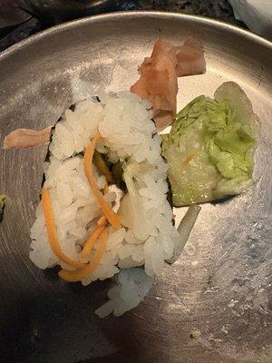 I pulled one piece of lettuce from the vegetable roll, a few carrot strands left