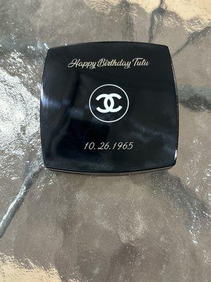 Outside of the Chanel compact engraved.