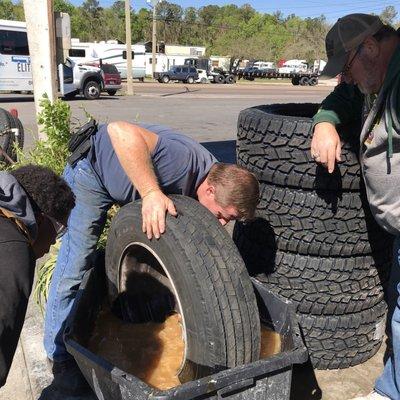 This guy did a really thorough inspection in &out of the dunk tank, but couldn't find the leak until he removed the tire from the rim.